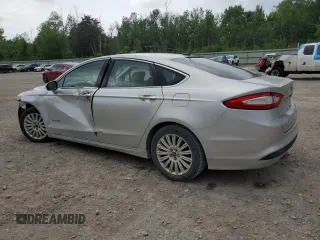 2016 Ford Fusion SE Hybrid with VIN 3FA6P0LU1GR366778, listed as a Copart auction lot 61280135 with 89,585 mi miles and Salvage title. Bid and sale history available at DreamBid. Image 2.