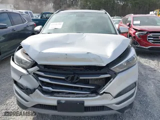 2018 Hyundai Tucson Value with VIN KM8J3CA21JU816783, listed as a IAAI auction lot 41716795 with 84,580 mi miles. Bid and sale history available at carsss.com. Image 12.