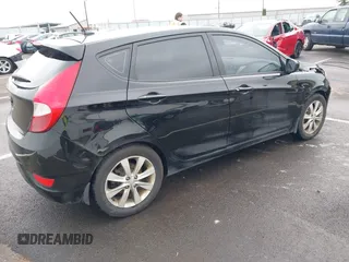 2012 Hyundai Accent SE with VIN KMHCU5AE1CU035390, listed as a IAAI auction lot 41765900 with 127,685 mi miles. Bid and sale history available at carsss.com. Image 4.