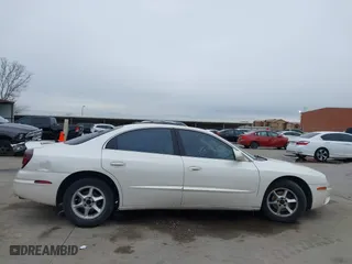 2002 Oldsmobile Aurora with VIN 1G3GR64H124127052, listed as a IAAI auction lot 41646711 with 198,141 mi miles. Bid and sale history available at carsss.com. Image 14.