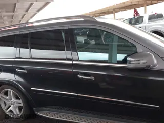 2012 Mercedes-Benz GL-Class GL 550 with VIN 4JGBF8GE4CA783163, listed as a IAAI auction lot 41756700 with 220,571 mi miles. Bid and sale history available at carsss.com. Image 13.