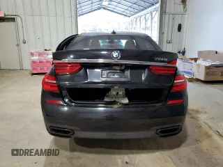 2016 BMW 7 Series 750i with VIN WBA7F0C5XGGL99017, listed as a Copart auction lot 84934504 with 0 mi miles and Salvage Title. Bid and sale history available at carsss.com. Image 6.
