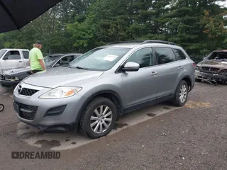 2010 Mazda CX-9 Sport with VIN JM3TB2MA6A0210360, listed as a IAAI auction lot 42711756 with 169,844 mi miles and . Bid and sale history available at DreamBid. Image 2.