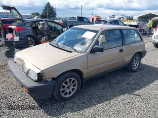 1986 Honda Civic z VIN JHMAH5325GS018658, wystawiony jako IAAI lot #41946339 z przebiegiem 69 518 mil mil oraz . Historia ofert i sprzedaży dostępna na DreamBid. Obrazek 2.