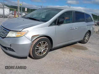 2012 Honda Odyssey EX-L with VIN 5FNRL5H63CB063815, listed as a IAAI auction lot 42302937 with 377,768 mi miles and . Bid and sale history available at DreamBid. Image 17.