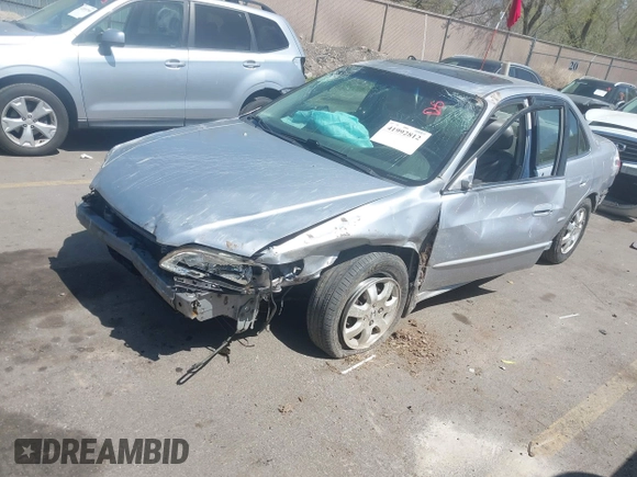 2002 Honda Accord EX z VIN JHMCG56612C026303, wystawiony jako IAAI lot #41992812 z przebiegiem 153 021 mil mil oraz . Historia ofert i sprzedaży dostępna na DreamBid. Obrazek 18.