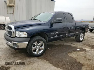 2002 Dodge 1500 z VIN 3D7HA18N72G169717, wystawiony jako Copart lot #59017415 z przebiegiem 202 609 mil mil oraz Szkoda całkowita • Salvage title. Historia ofert i sprzedaży dostępna na DreamBid. Obrazek 1.