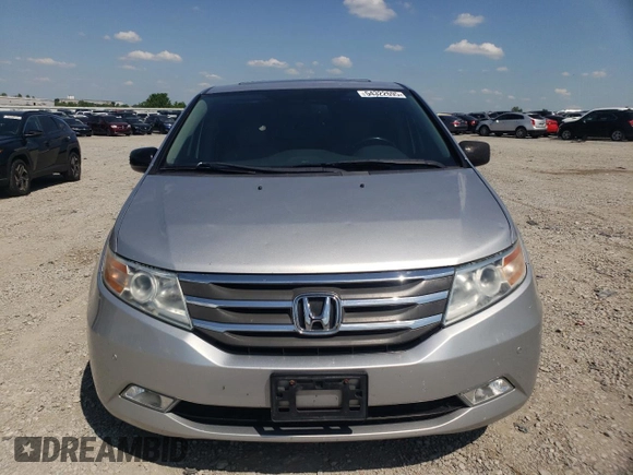 2012 Honda Odyssey Touring with VIN 5FNRL5H94CB009952, listed as a Copart auction lot 54322695 with 135,551 mi miles and Salvage title. Bid and sale history available at DreamBid. Image 5.
