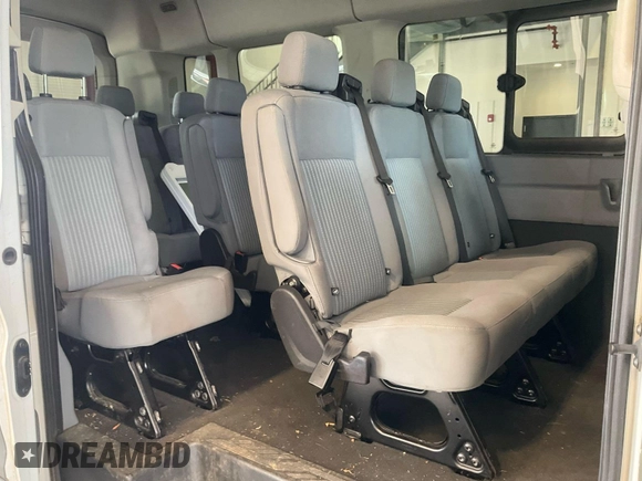 2017 Ford Transit XL z VIN 1FBAX2CM4HKA64864, wystawiony jako IAAI lot #42636468 z przebiegiem 56 010 mil mil oraz . Historia ofert i sprzedaży dostępna na DreamBid. Obrazek 3.