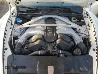 2016 Aston Martin DB9 z VIN SCFFDAFM1GGB17218, wystawiony jako Copart lot #78536404 z przebiegiem Nie podano mil oraz Nie do naprawy. Historia ofert i sprzedaży dostępna na DreamBid. Obrazek 11.