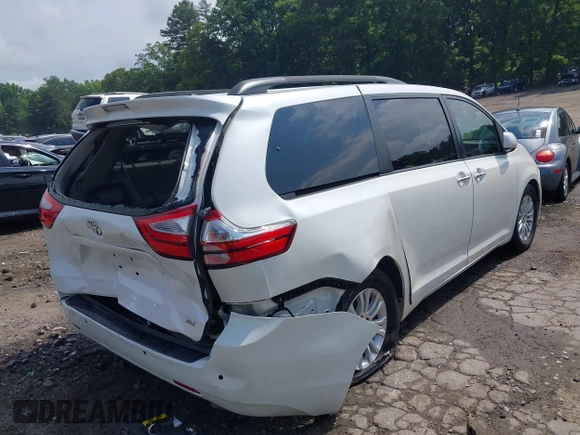 2015 Toyota Sienna XLE with VIN 5TDYK3DC5FS613045, listed as a IAAI auction lot 42276147 with 108,271 mi miles and . Bid and sale history available at DreamBid. Image 6.
