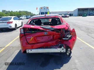 2022 Toyota Prius L Eco with VIN JTDKAMFU6N3158307, listed as a IAAI auction lot 42042768 with 17,882 mi miles and . Bid and sale history available at DreamBid. Image 16.