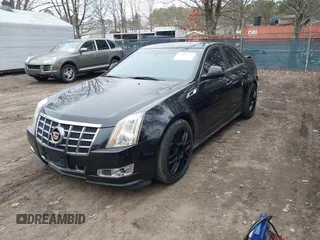 2012 Cadillac CTS Premium with VIN 1G6DS5E30C0103972, listed as a IAAI auction lot 41800076 with 92,100 mi miles and . Bid and sale history available at DreamBid. Image 2.