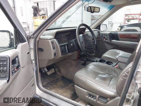 1994 Jeep Grand Cherokee Limited with VIN 1J4GZ78Y8RC165923, listed as a IAAI auction lot 42275894 with 247,977 mi miles and . Bid and sale history available at DreamBid. Image 5.
