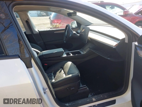 2024 Tesla Model Y Performance with VIN 7SAYGDEF3RA281969, listed as a IAAI auction lot 41680674 with 22,615 mi miles and . Bid and sale history available at DreamBid. Image 5.