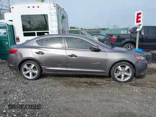 2013 Acura ILX Premium z VIN 19VDE1F54DE001539, wystawiony jako IAAI lot #42015973 z przebiegiem Nie podano mil oraz . Historia ofert i sprzedaży dostępna na DreamBid. Obrazek 12.