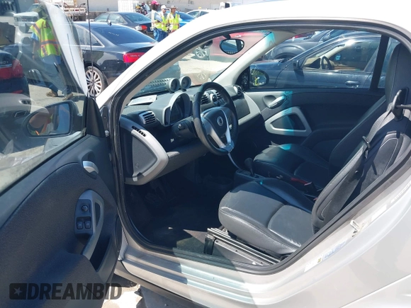 2008 Smart fortwo Pure with VIN WMEEJ31X68K106096, listed as a IAAI auction lot 42456471 with 92,074 mi miles and . Bid and sale history available at DreamBid. Image 12.