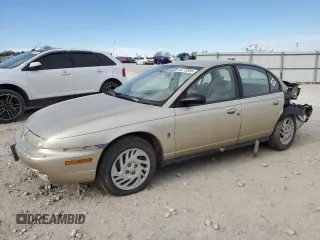 1999 Saturn SL z VIN 1G8ZK5278XZ269792, wystawiony jako Copart lot #48773395 z przebiegiem 159 506 mil mil oraz Szkoda całkowita • Salvage title. Historia ofert i sprzedaży dostępna na DreamBid. Obrazek 1.