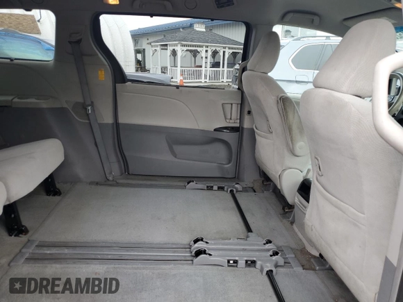 2014 Toyota Sienna LE AAS with VIN 5TDKK3DC9ES521442, listed as a Copart auction lot 64471525 with 331,395 mi miles and Salvage title. Bid and sale history available at DreamBid. Image 11.