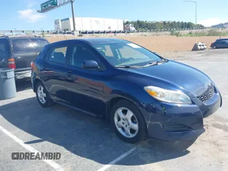 2009 Toyota Matrix with VIN 2T1KU40E89C114928, listed as a IAAI auction lot 41915354 with 210,305 mi miles. Bid and sale history available at carsss.com. Image 1.