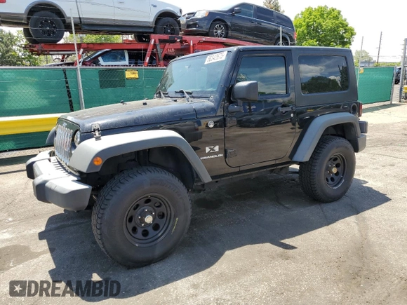 2009 Jeep Wrangler X z VIN 1J4FA24179L716499, wystawiony jako Copart lot #58342675 z przebiegiem 116 871 mil mil oraz Szkoda całkowita • Salvage title. Historia ofert i sprzedaży dostępna na DreamBid. Obrazek 1.