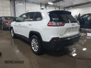 2019 Jeep Cherokee Latitude with VIN 1C4PJLCX2KD205286, listed as a IAAI auction lot 41276437 with 112,333 mi miles. Bid and sale history available at carsss.com. Image 3.