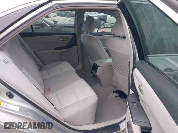 2015 Toyota Camry XLE with VIN 4T4BF1FKXFR472201, listed as a IAAI auction lot 41883944 with 143,296 mi miles and . Bid and sale history available at DreamBid. Image 8.
