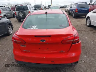 2016 Ford Focus SE z VIN 1FADP3F23GL285640, wystawiony jako IAAI lot #42066370 z przebiegiem 97 007 mil mil oraz . Historia ofert i sprzedaży dostępna na DreamBid. Obrazek 6.