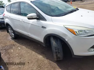 2013 Ford Escape SEL with VIN 1FMCU9HX6DUB14053, listed as a IAAI auction lot 42361297 with 144,861 mi miles and . Bid and sale history available at DreamBid. Image 13.