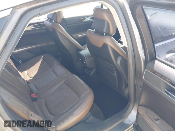 2014 Lincoln MKZ z VIN 3LN6L2G92ER835456, wystawiony jako IAAI lot #41985573 z przebiegiem 174 080 mil mil oraz . Historia ofert i sprzedaży dostępna na DreamBid. Obrazek 8.
