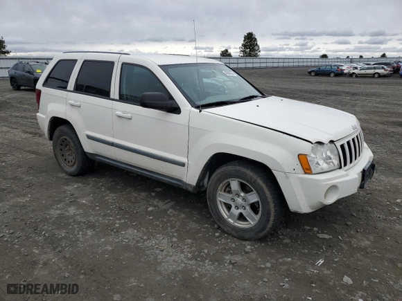 2007 Jeep Grand Cherokee Laredo with VIN 1J8GR48K17C638499, listed as a Copart auction lot 49649565 with 195,000 mi miles and Salvage Title. Bid and sale history available at carsss.com. Image 4.