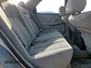 2001 Toyota Camry CE z VIN 4T1BG22K01U085409, wystawiony jako Copart lot #55941765 z przebiegiem 215 062 mil mil oraz Szkoda całkowita • Salvage title. Historia ofert i sprzedaży dostępna na DreamBid. Obrazek 10.