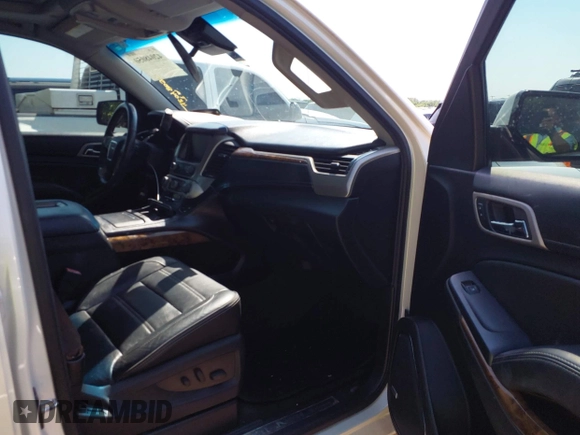 2015 GMC Yukon Denali with VIN 1GKS1CKJ8FR575730, listed as a IAAI auction lot 42048050 with 113,077 mi miles. Bid and sale history available at carsss.com. Image 5.