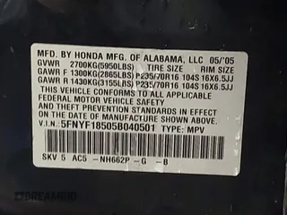 2005 Honda Pilot EX-L with VIN 5FNYF18505B040501, listed as a IAAI auction lot 41810441 with 237,369 mi miles. Bid and sale history available at carsss.com. Image 9.