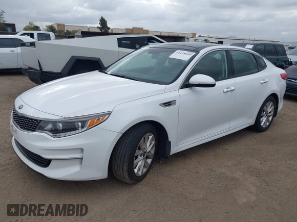 2016 Kia Optima EX with VIN 5XXGU4L31GG086203, listed as a IAAI auction lot 42128099 with 157,988 mi miles. Bid and sale history available at carsss.com. Image 2.