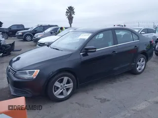 2013 Volkswagen Jetta TDI w/Premium/Nav with VIN 3VWLL7AJ4DM248448, listed as a IAAI auction lot 41749189 with 85,933 mi miles and . Bid and sale history available at DreamBid. Image 2.