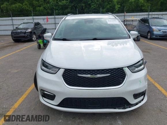 2022 Chrysler Pacifica Touring L with VIN 2C4RC1BG3NR149675, listed as a IAAI auction lot 42470593 with 59,956 mi miles and . Bid and sale history available at DreamBid. Image 12.