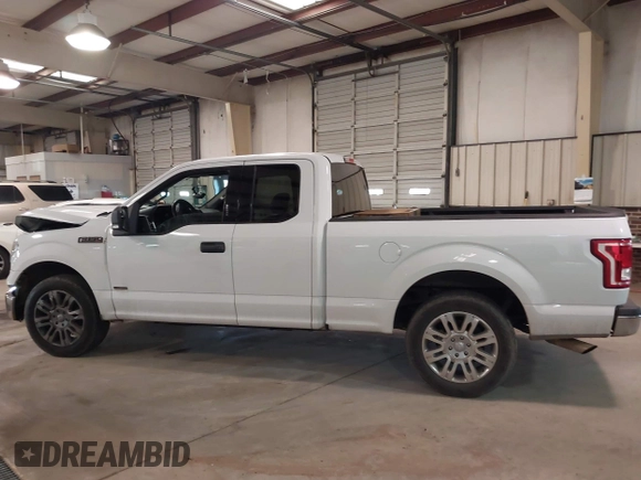 2015 Ford F-150 XL with VIN 1FTEX1CG5FKD31637, listed as a IAAI auction lot 41607827 with 201,278 mi miles. Bid and sale history available at carsss.com. Image 14.