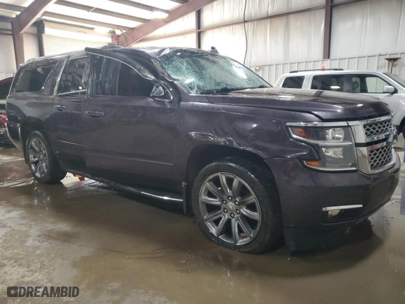 2015 Chevrolet Suburban LTZ with VIN 1GNSKKKC6FR689544, listed as a Copart auction lot 47524065 with 157,822 mi miles and Salvage Title. Bid and sale history available at carsss.com. Image 4.