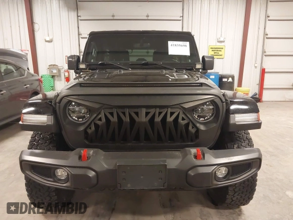 2021 Jeep Wrangler Unlimited Rubicon with VIN 1C4HJXFN2MW719135, listed as a IAAI auction lot 41835698 with 20,447 mi miles and . Bid and sale history available at DreamBid. Image 12.