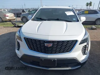 2022 Cadillac XT4 FWD Premium Luxury с VIN 1GYFZCR48NF138181, выставлен на аукционе IAAI как лот 42187527 с пробегом Не указан миль и . История ставок и продаж доступна на DreamBid. Изображение 6.