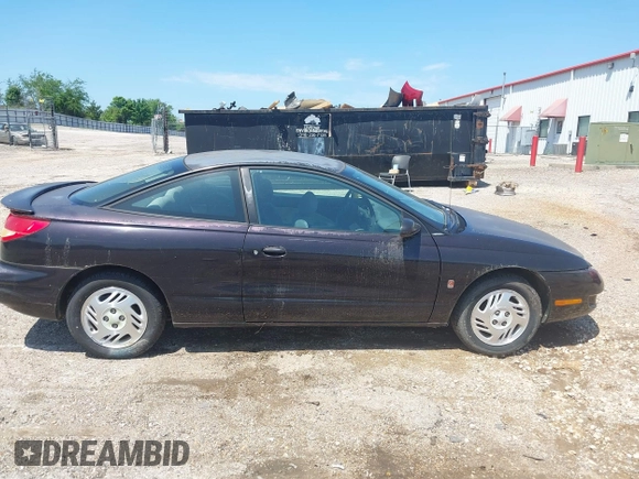 2000 Saturn SC with VIN 1G8ZR1275YZ113537, listed as a IAAI auction lot 42073307 with 276,289 mi miles and . Bid and sale history available at carsss.com. Image 12.