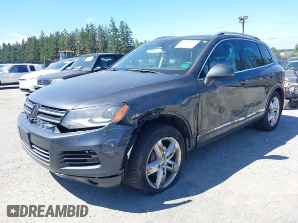 2012 Volkswagen Touareg Sport with VIN WVGFK9BP0CD004951, listed as a IAAI auction lot 42724125 with 173,993 mi miles and . Bid and sale history available at DreamBid. Image 17.