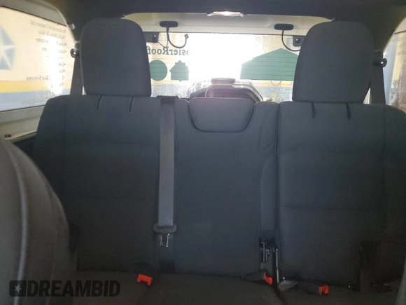 2023 Jeep Wrangler Sport with VIN 1C4HJXDG3PW670651, listed as a Copart auction lot 54013405 with 19,395 mi miles and Clean Title. Bid and sale history available at DreamBid. Image 10.