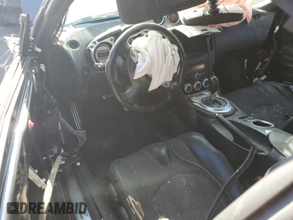 2012 Nissan 370Z Touring z VIN JN1AZ4FHXCM370659, wystawiony jako Copart lot #69714024 z przebiegiem Nie podano mil oraz Czysty tytuł • Clean title. Historia ofert i sprzedaży dostępna na DreamBid. Obrazek 8.