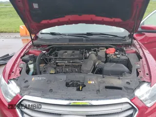 2014 Ford Taurus SEL z VIN 1FAHP2E83EG125622, wystawiony jako IAAI lot #42204238 z przebiegiem 134 032 mil mil oraz . Historia ofert i sprzedaży dostępna na DreamBid. Obrazek 10.