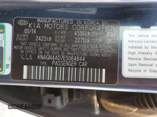 2014 Kia Optima Hybrid EX with VIN KNAGN4AD7E5064844, listed as a Copart auction lot 70834994 with 123,547 mi miles and Salvage Title. Bid and sale history available at carsss.com. Image 12.