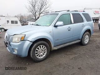 2008 Mercury Mariner Premier z VIN 4M2CU97158KJ04790, wystawiony jako IAAI lot #41061682 z przebiegiem 196 724 mil mil oraz . Historia ofert i sprzedaży dostępna na DreamBid. Obrazek 2.