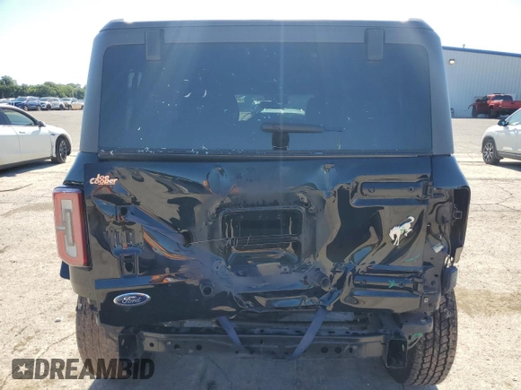 2023 Ford Bronco с VIN 1FMEE5DP8PLB53774, выставлен на аукционе Copart как лот 58173005 с пробегом 42 582 миль миль и Списание • Salvage title. История ставок и продаж доступна на DreamBid. Изображение 6.
