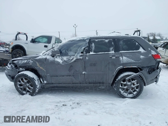 2021 Jeep Grand Cherokee Limited z VIN 1C4RJFBGXMC654414, wystawiony jako IAAI lot #41601774 z przebiegiem 83 654 mil mil oraz . Historia ofert i sprzedaży dostępna na DreamBid. Obrazek 14.